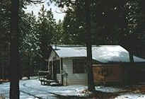 Cabin #2 in winter snows at gathering light ... a retreat: tree houses, treehouses, the cottage, cabins. gathering light, a retreat offering cabins near crater lake national park and klamath basin birding trails in southern oregon. cabins, tree houses, rv camping and vacation rentals in the forest on the river near crater lake national park and klamath basin birding trails.