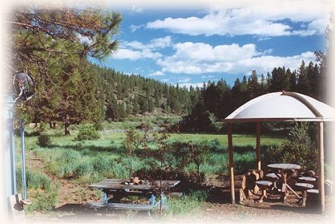 the cottage and cabins on the river in the forest at Gathering Light ... a retreat for nature lovers, a retreat for writers and artists, for lovers and honeymooners and a peaceful, personal spiritual retreat. Offering private, studio cabins, treehouses, vacation rentals, group and family lodging, the retreat is located in southern oregon near crater lake national park.