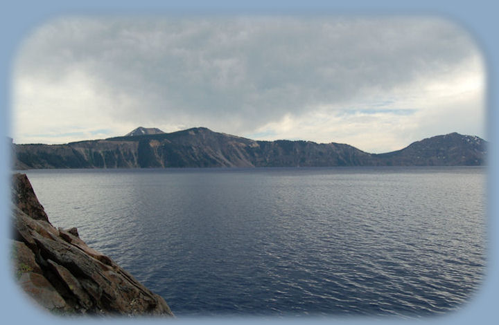 down at the water's edge at Crater Lake National Park in the cascade mountains of oregon.